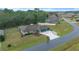 An aerial view of a house and neighborhood at 16 Hickory Loop Way, Ocala, FL 34472