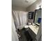 Bathroom with tub, shower, vanity, and updated fixtures at 1701 Se 24Th Rd # 201, Ocala, FL 34471