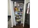 Organized pantry with wire shelving and ample storage space for food and household items at 1701 Se 24Th Rd # 201, Ocala, FL 34471