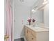Clean bathroom with updated vanity and shower at 21202 Sandalwood Dr # 21-202, Wildwood, FL 34785