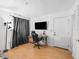 Spacious bedroom with large window and wood floors at 21202 Sandalwood Dr # 21-202, Wildwood, FL 34785