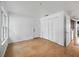 Large living room with light wood laminate flooring at 21202 Sandalwood Dr # 21-202, Wildwood, FL 34785