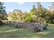 Large backyard with a garden area and beehive at 2821 Se 80Th St, Ocala, FL 34480