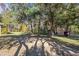 Wooded backyard with a storage shed at 2821 Se 80Th St, Ocala, FL 34480
