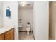 Clean bathroom with toilet, urinal, and updated flooring at 2821 Se 80Th St, Ocala, FL 34480