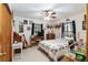 Bedroom with a queen-size bed and various personal items at 2821 Se 80Th St, Ocala, FL 34480