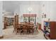 Bright dining room with wood table and chairs at 2821 Se 80Th St, Ocala, FL 34480