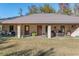 Brick home with a large covered porch at 2821 Se 80Th St, Ocala, FL 34480