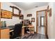 Home office features a corner desk and built-in shelving at 2821 Se 80Th St, Ocala, FL 34480
