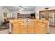 Kitchen island with double sink and wood countertop at 2821 Se 80Th St, Ocala, FL 34480