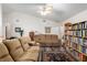 Relaxing living room with sectional sofas and area rug at 2821 Se 80Th St, Ocala, FL 34480