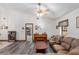 Bright living room with sectional sofa and a piano at 2821 Se 80Th St, Ocala, FL 34480