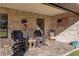 Relaxing covered porch with rocking chairs at 2821 Se 80Th St, Ocala, FL 34480