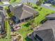 Aerial view showing home, backyard, and surrounding neighborhood at 3416 Eisenhower Way, The Villages, FL 32163