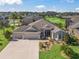Single-Gathering home with two-car garage and landscaped yard at 3416 Eisenhower Way, The Villages, FL 32163