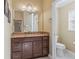 Bathroom with single vanity and toilet at 3416 Eisenhower Way, The Villages, FL 32163