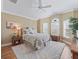 Spacious bedroom with wood flooring and plenty of natural light at 3416 Eisenhower Way, The Villages, FL 32163