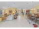 Open floor plan, combining living and dining areas at 3416 Eisenhower Way, The Villages, FL 32163