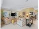 Spacious living room with ample natural light and comfortable seating at 3416 Eisenhower Way, The Villages, FL 32163
