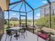 Enjoy this screened patio overlooking the golf course at 3416 Eisenhower Way, The Villages, FL 32163