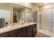 Double vanity bathroom with shower and linen closet at 348 Hickory Course Trl, Ocala, FL 34472