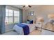 Bedroom with water view and blue bedding at 348 Hickory Course Trl, Ocala, FL 34472