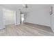 Bedroom with walk-in closet and wood-look floors at 4480 Nw 79Th Terrace Rd, Ocala, FL 34482