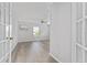 Bright and airy bedroom with wood-look flooring at 4480 Nw 79Th Terrace Rd, Ocala, FL 34482