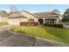 Single-story home with attached garage and landscaped yard at 4480 Nw 79Th Terrace Rd, Ocala, FL 34482