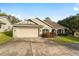 Single-story home with attached garage and landscaped yard at 4480 Nw 79Th Terrace Rd, Ocala, FL 34482