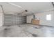 Spacious garage with overhead door and extra storage space at 4480 Nw 79Th Terrace Rd, Ocala, FL 34482