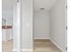 Hallway with light gray walls and wood-look floors at 4480 Nw 79Th Terrace Rd, Ocala, FL 34482