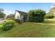 House exterior showcasing landscaping and a manicured lawn at 4480 Nw 79Th Terrace Rd, Ocala, FL 34482