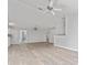 Open concept living room with high ceilings and LVP flooring at 4480 Nw 79Th Terrace Rd, Ocala, FL 34482