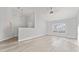 Bright living room with vaulted ceilings and LVP flooring at 4480 Nw 79Th Terrace Rd, Ocala, FL 34482