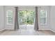 Bright living room with sliding glass doors leading to patio at 4480 Nw 79Th Terrace Rd, Ocala, FL 34482
