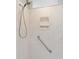 Walk-in shower with grab bar and marble walls at 4480 Nw 79Th Terrace Rd, Ocala, FL 34482