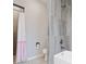 Small bathroom with shower and tub at 4880 Sw 106Th St, Ocala, FL 34476