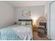 Guest bedroom with queen bed and window at 4880 Sw 106Th St, Ocala, FL 34476