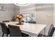 Bright dining room features a large table with seating for six at 4880 Sw 106Th St, Ocala, FL 34476