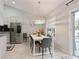 Bright dining area with large table and access to the pool at 4880 Sw 106Th St, Ocala, FL 34476