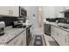 Modern kitchen with stainless steel appliances and granite countertops at 4880 Sw 106Th St, Ocala, FL 34476