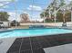 Relaxing screened-in pool with waterfall feature at 4880 Sw 106Th St, Ocala, FL 34476