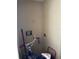 Small laundry room with a bike and chair at 52 Pine Trak # G 104, Ocala, FL 34472
