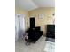 Living room with black couch and decorative accents at 52 Pine Trak # G 104, Ocala, FL 34472