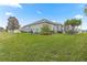 Spacious backyard with grassy area and privacy fence at 5908 Nw 24Th St, Ocala, FL 34482
