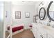 Elegant bathroom with double vanity, soaking tub, and wood-look floors at 5908 Nw 24Th St, Ocala, FL 34482