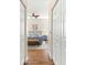 Blue bedroom with a ceiling fan and hardwood floors at 5908 Nw 24Th St, Ocala, FL 34482