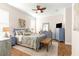 Serene bedroom with a comfy bed, dresser, and TV at 5908 Nw 24Th St, Ocala, FL 34482