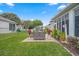 Relaxing patio with seating area and lush lawn at 5908 Nw 24Th St, Ocala, FL 34482